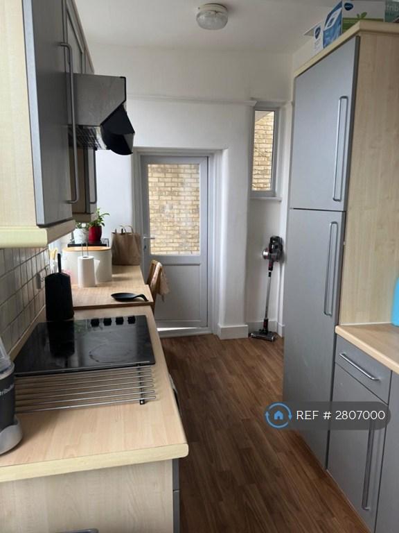 Kitchen (Looking Onto Balcony Door)