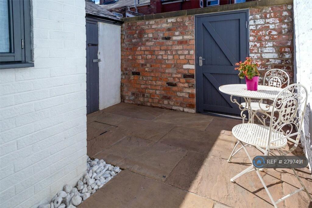 Private Enclosed Courtyard With Storage Unit