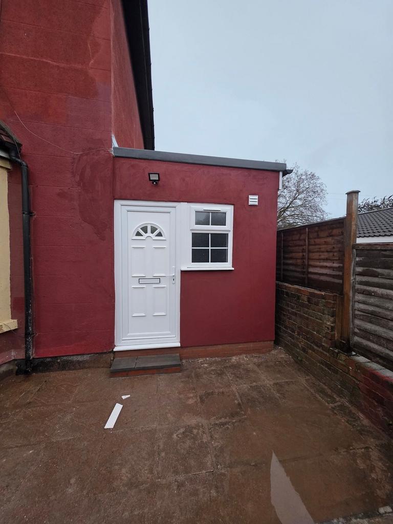 Well-presented rear/side entrance with a clean ...