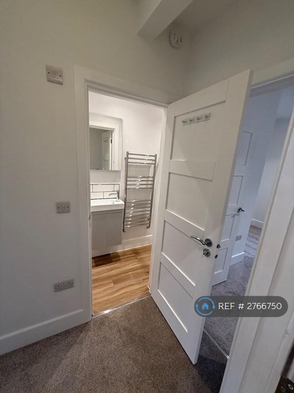 Looking From Top Of Stairs Into 2nd Bathroom