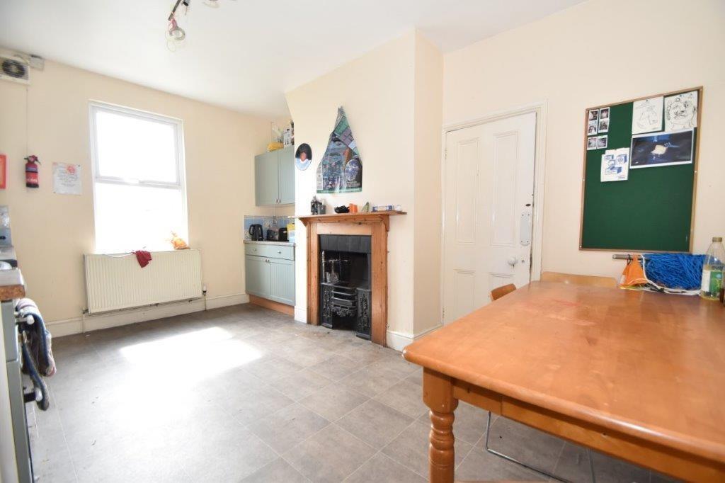 Bright, well-kept kitchen with a large window, ...