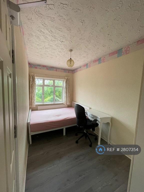 Upstairs Bedroom With Cupboard And Desk