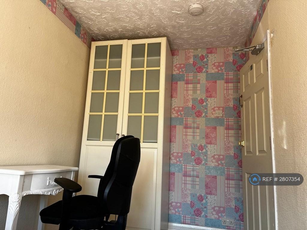 Upstairs Bedroom With Cupboard And Desk