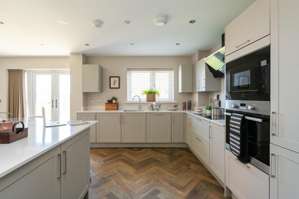 The kitchen provides ample storage space