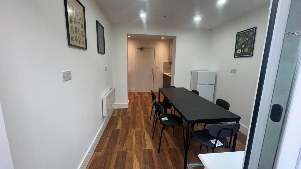 Bright, modern open-plan kitchen/dining area wi...