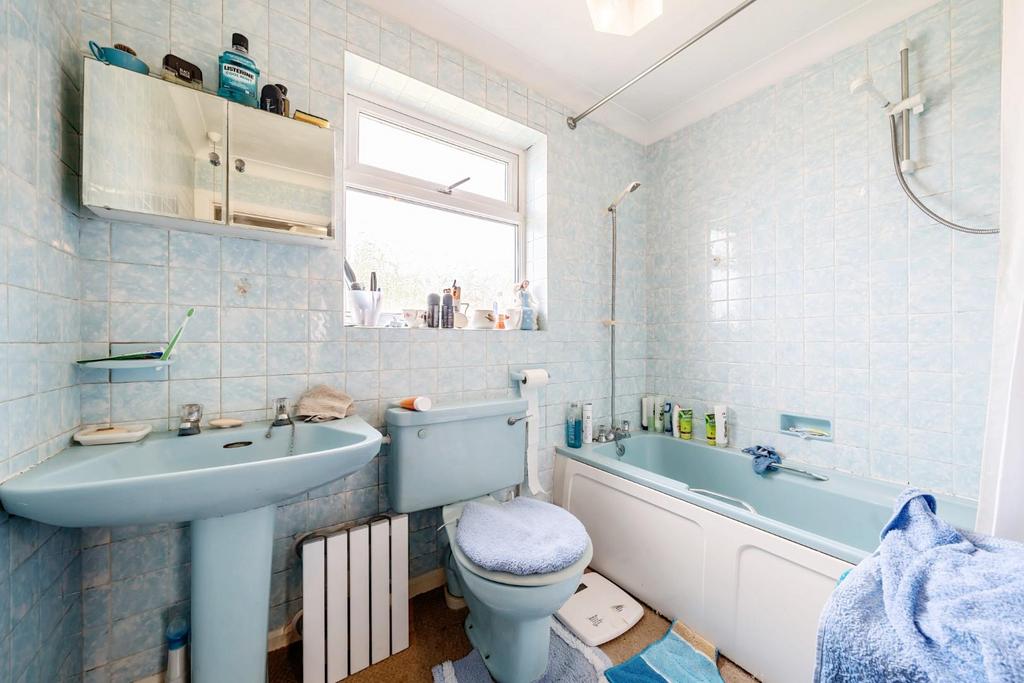 Bathroom with separate shower over.jpg