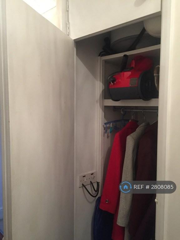 Storage Cupboard In Hallway