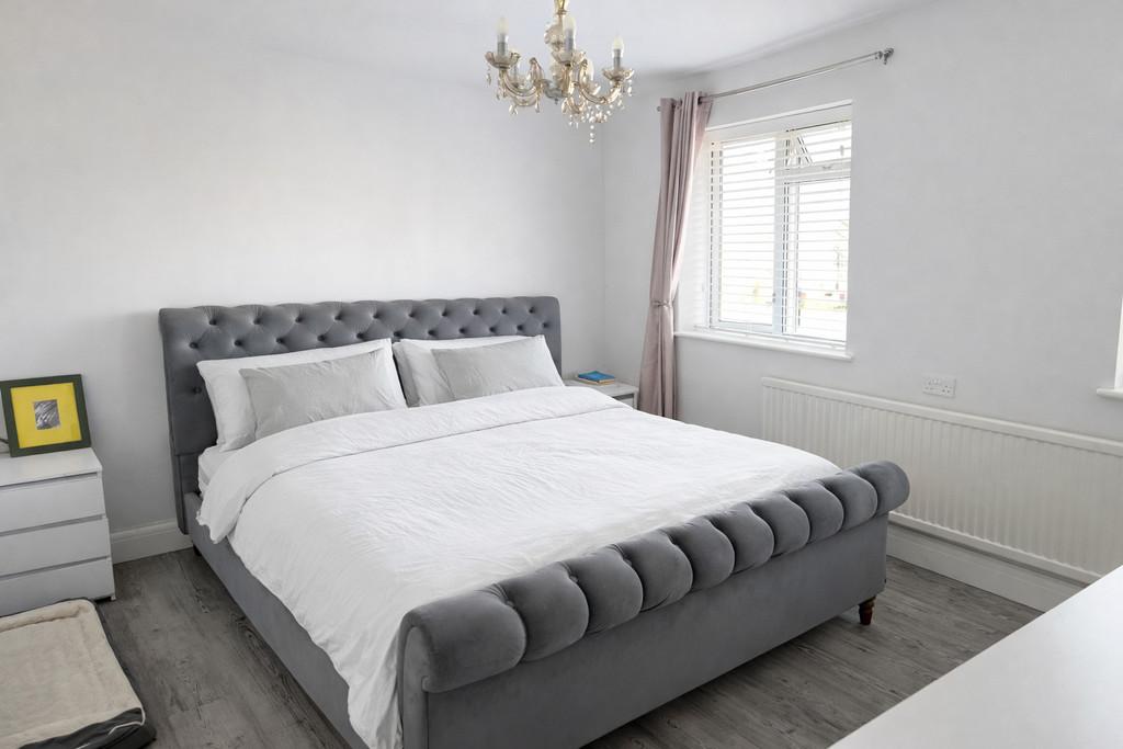 Elegant bedroom with king-size bed
