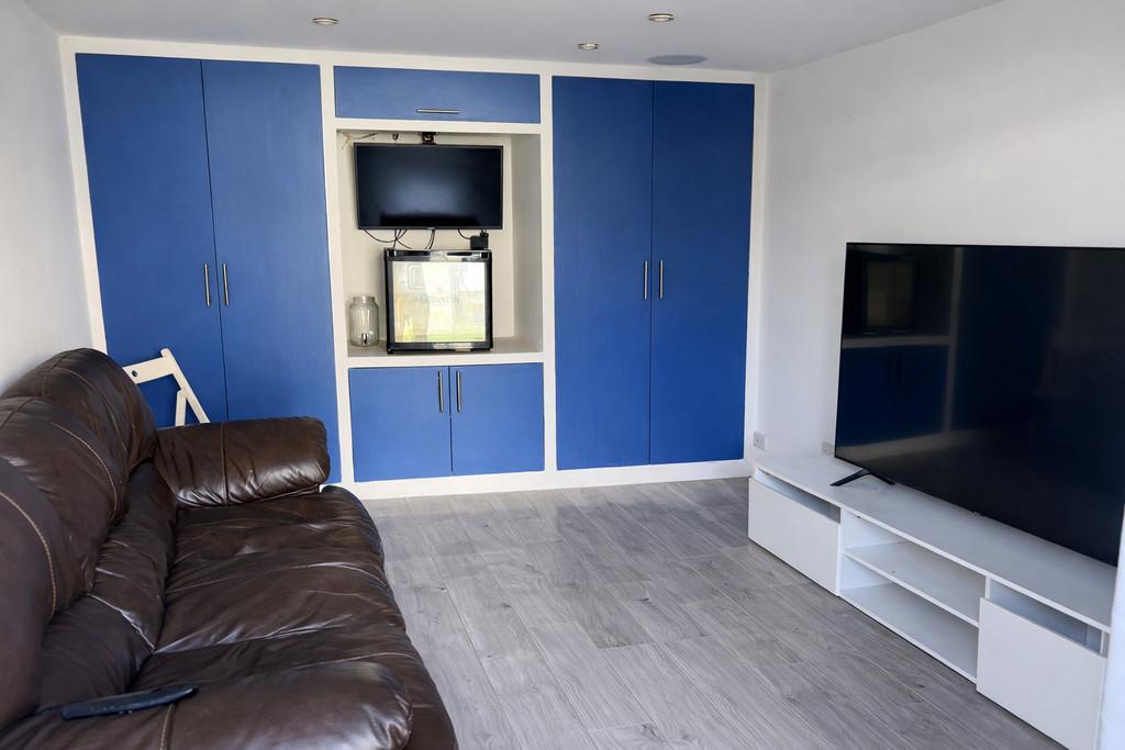 Modern living room with sleek storage units