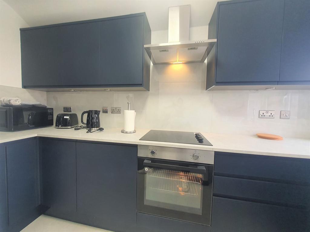 Shared kitchen with two others