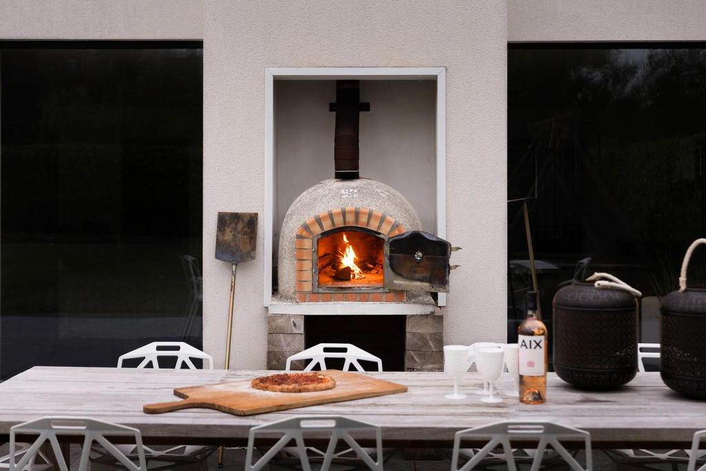 'COOK OUT' DINING SPACE & A WOOD FIRED OVEN.jpg