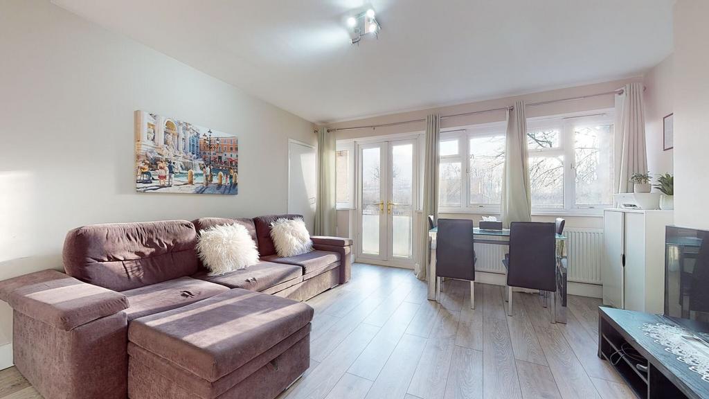 Bright, modern living room with a comfortable L...