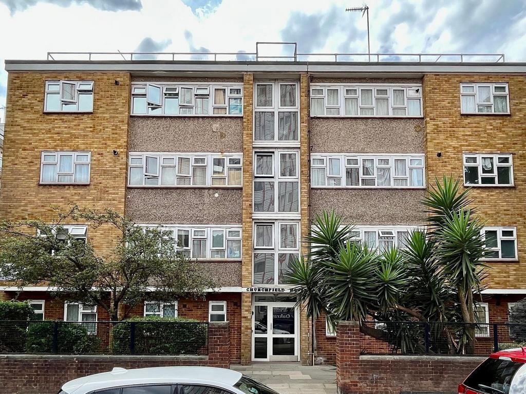 Clean mid-century apartment block with brick an...