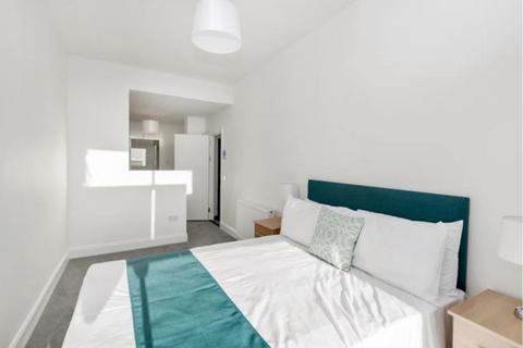 undefined, 12 Dock Street Room 3