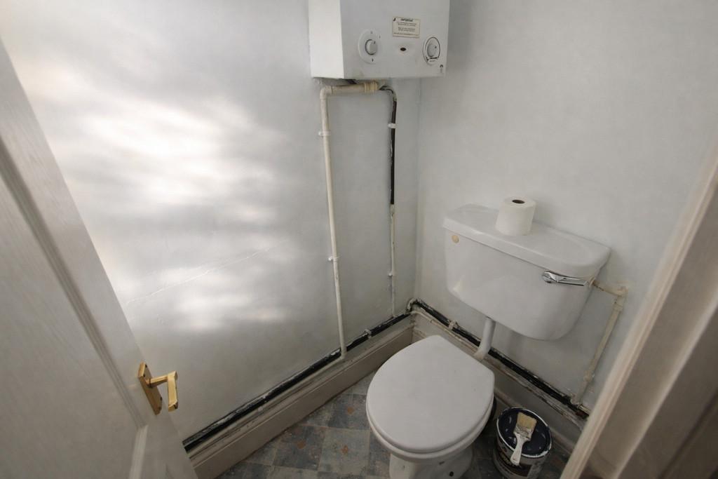 Small bathroom with blue-gray tiles
