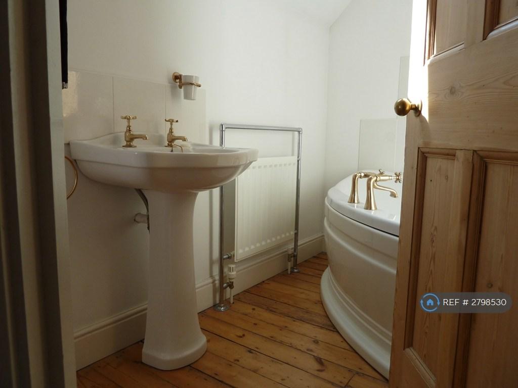 Large Bathroom With Shower Over Bath
