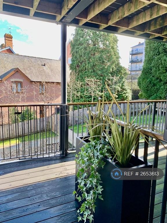 Covered Balcony With Garden Views