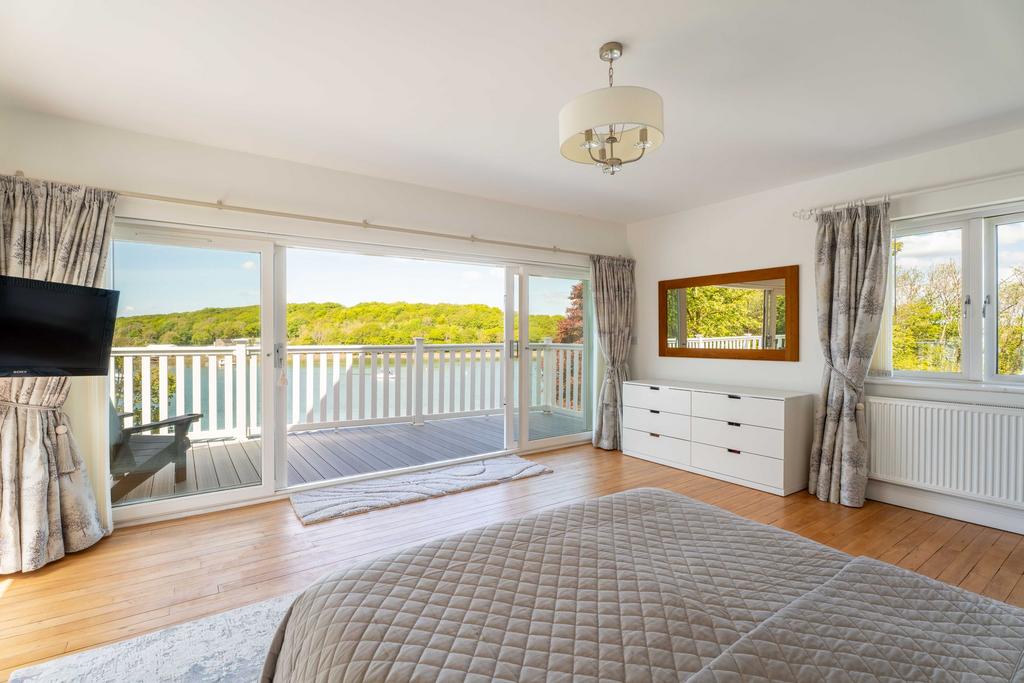 Principle Bedroom with wrap around balcony and...