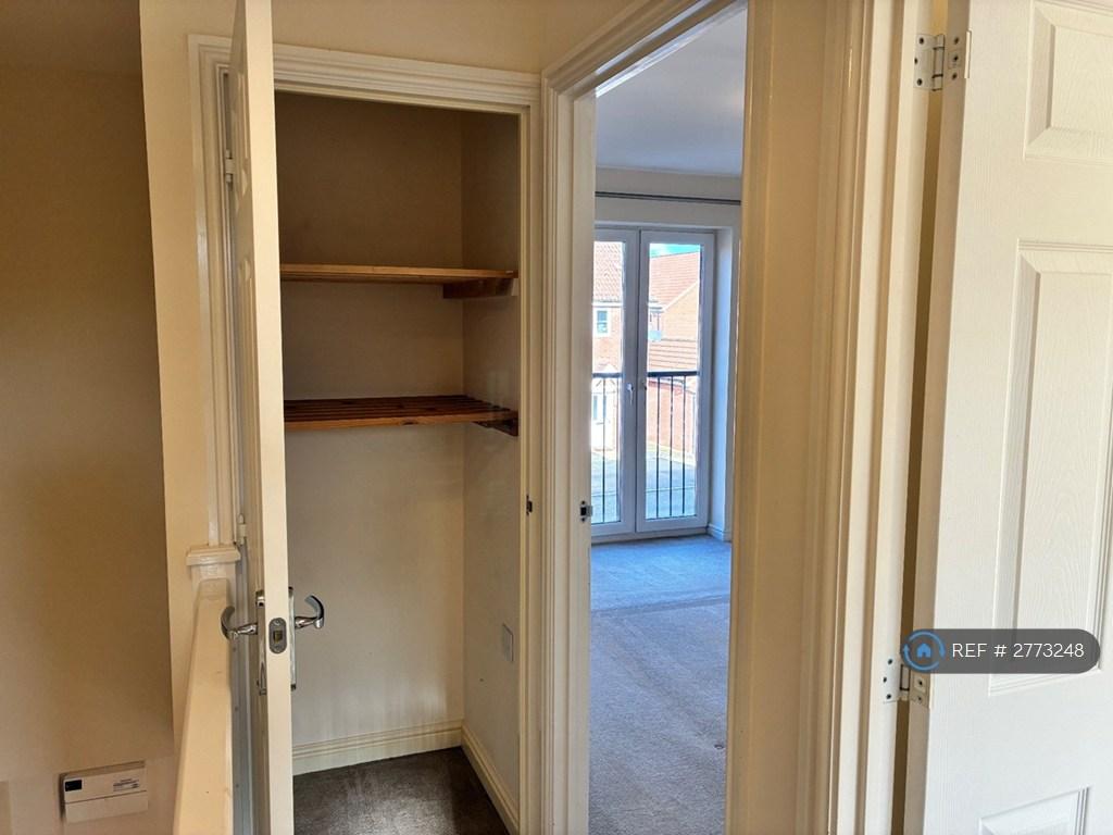 Upstairs Storage Cupboard.