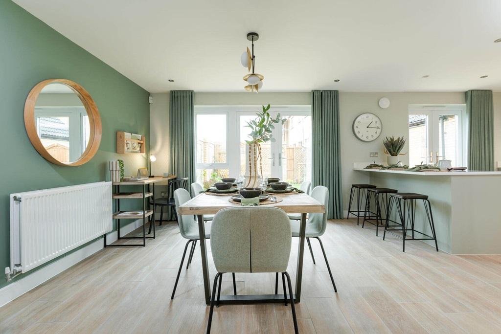 Double doors lead from the dining area to the...