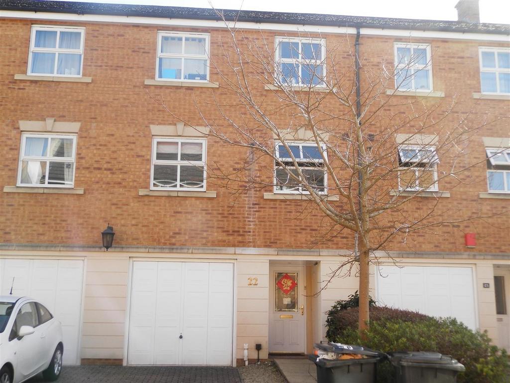 Three-storey brick terraced property with integ...