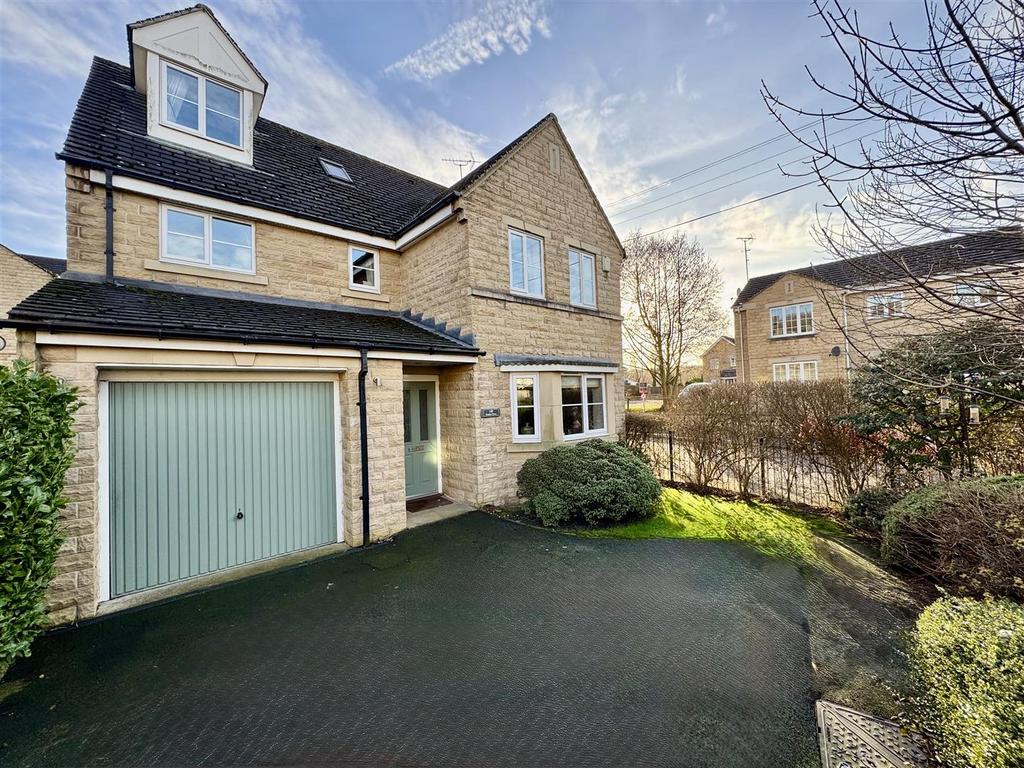 External front, garage and driveway