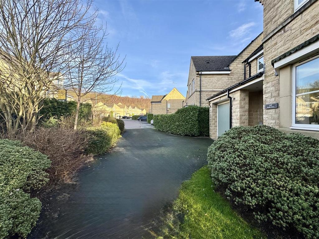 External front, garage and driveway