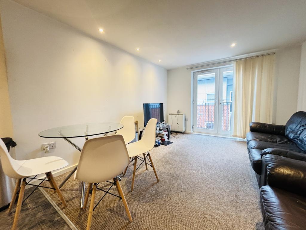 Spacious Top Floor Apartment with Secure Parking