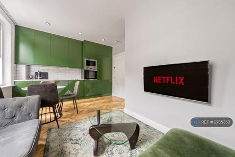 undefined, Great Titchfield St, London, W1W