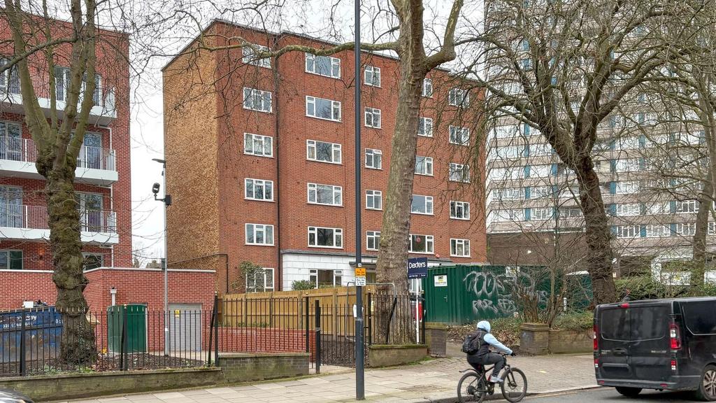 Street-facing view of a red-brick residential b...