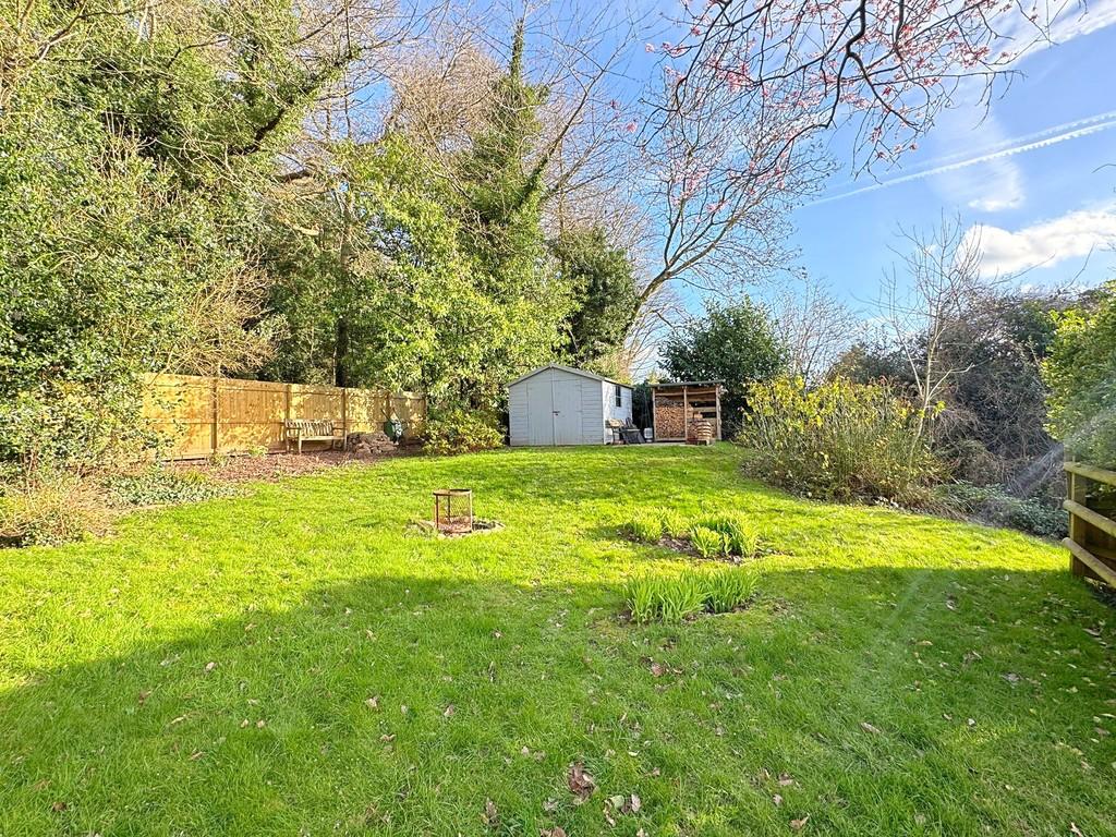 Rear garden to shed and log store