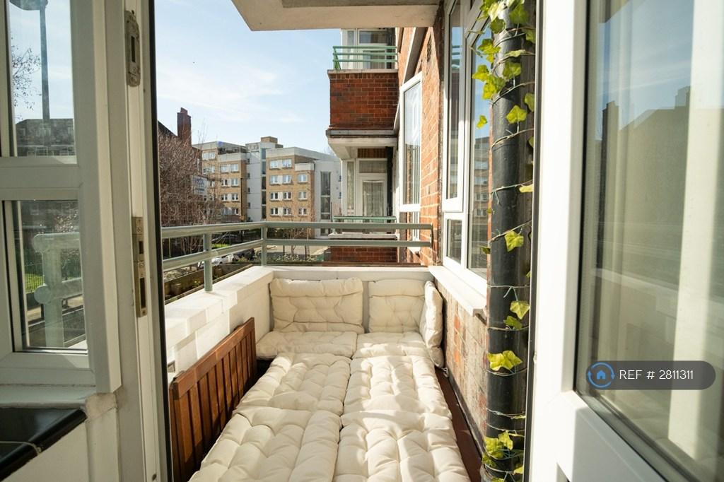 Balcony With Fold Up Furniture In Sun Lounger Mode