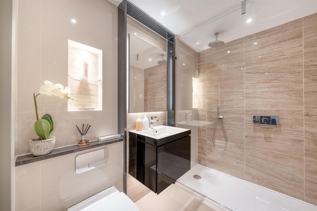 Luxury bathroom with modern tiling and high-qualit