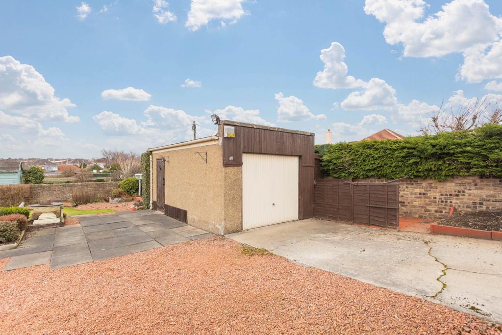 Garden and garage of 40 Craigs Crescent