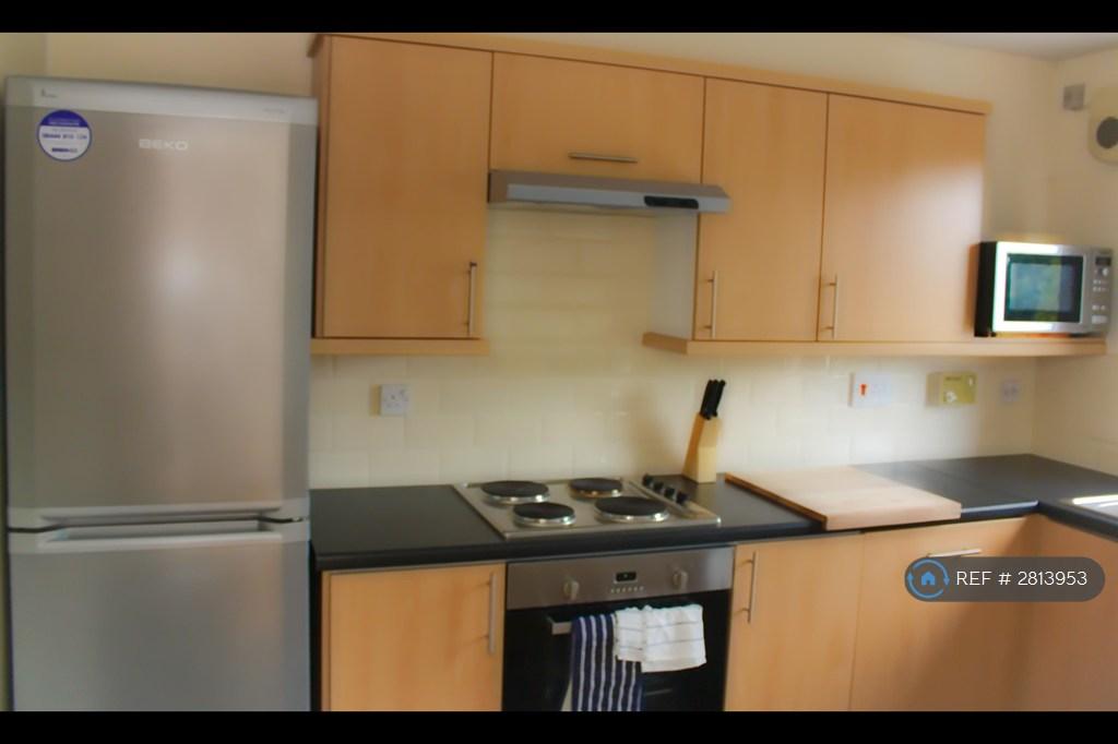 Kitchen Showing Large Fridge Freezer.