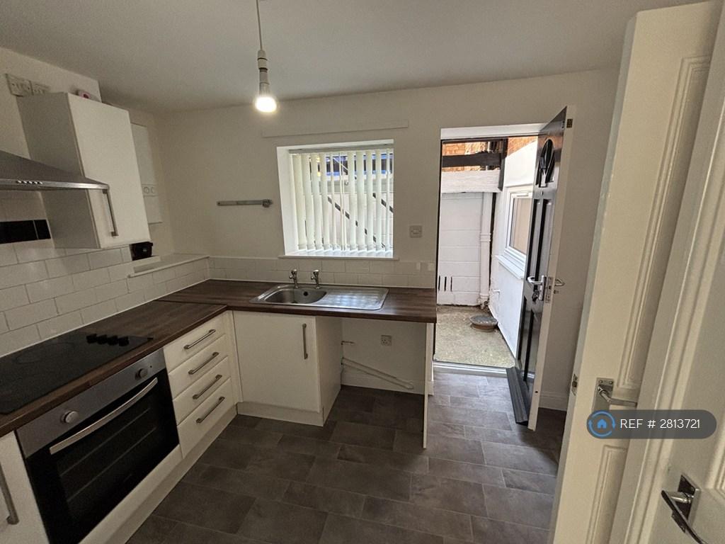 Kitchen And Entrance To Flat