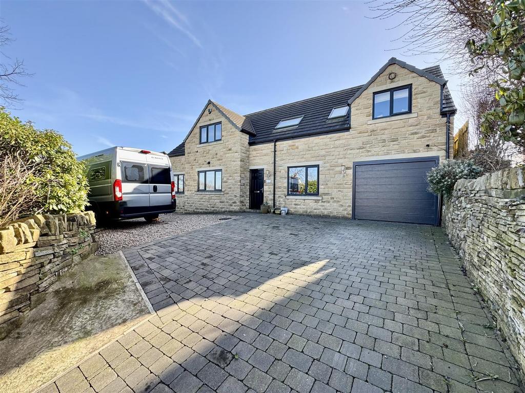 External front, garage and driveway
