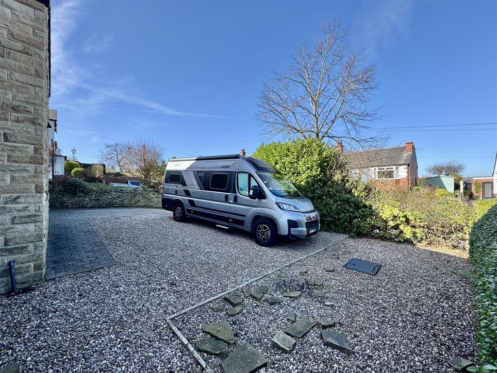 External front, garage and driveway