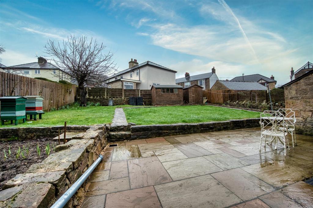 Rear Garden - dining patio and lawn.jpg