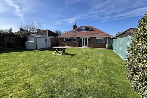 4 bedroom chalet for sale, Keysworth Avenue, Barton On Sea, New Milton, Hampshire. BH25 7HZ