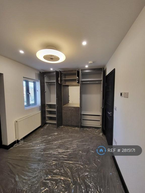 Master Bedroom With Open Wardrobe