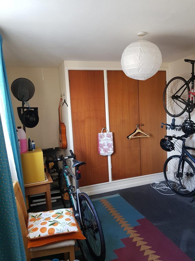 Bright, practical single bedroom with built-in ...