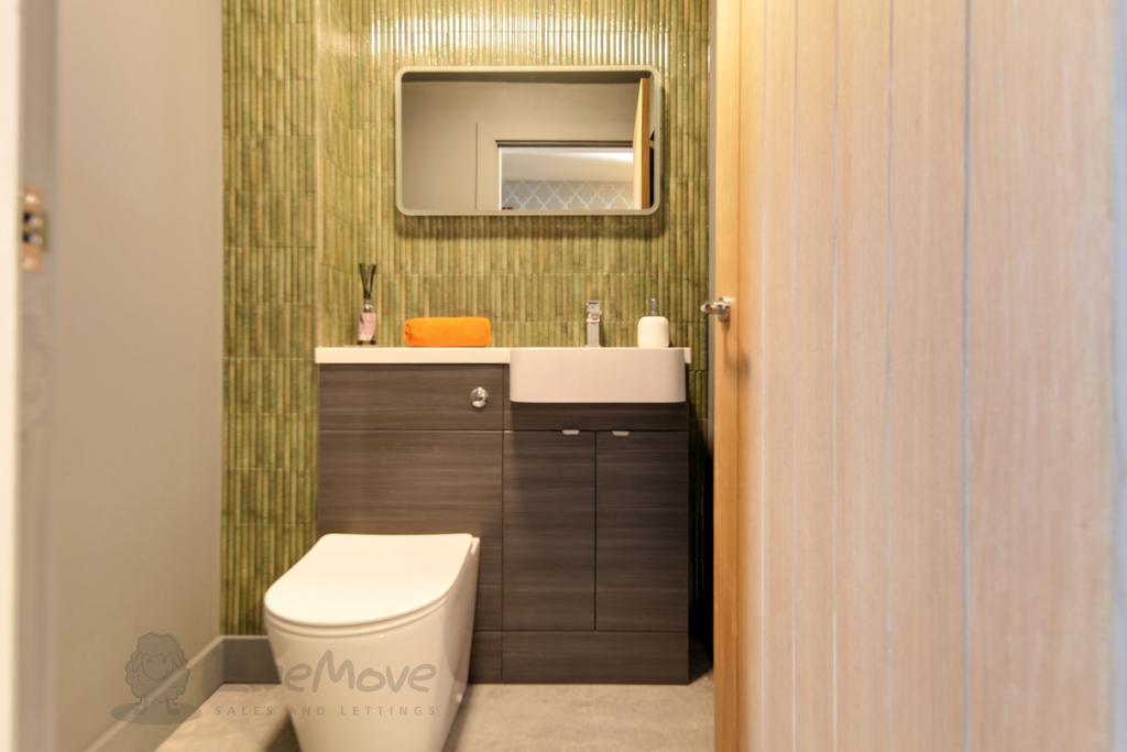 Designer tiles and sink unit with heated coat area