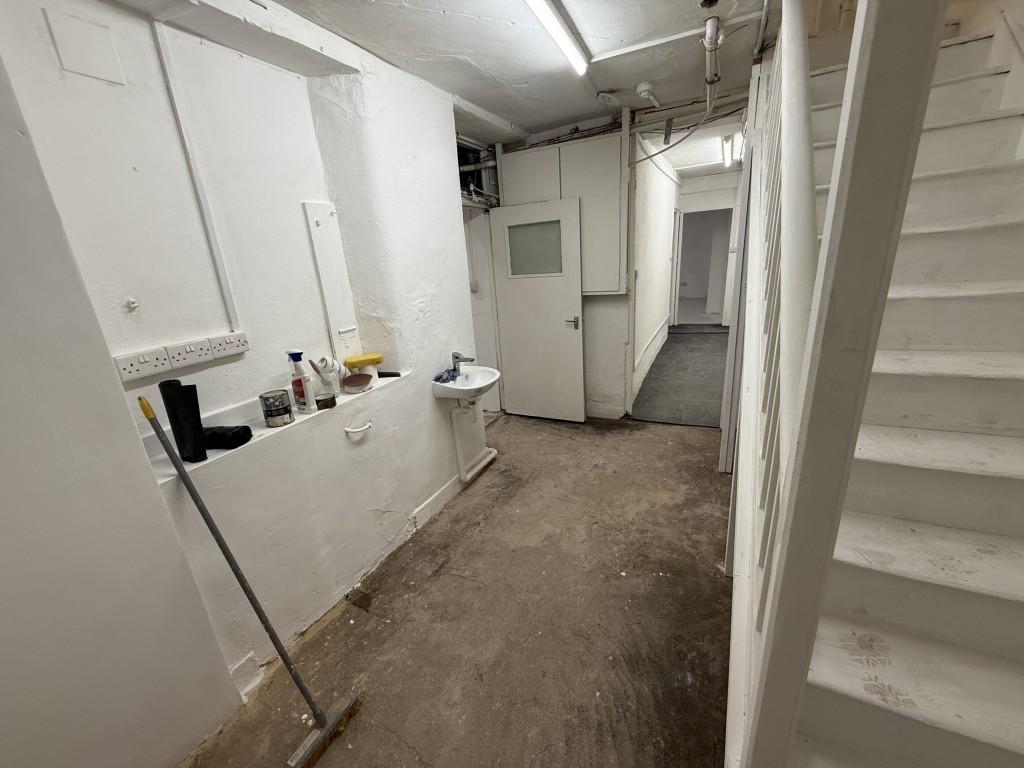 Basement room 3 entrance and stairs from staff kit
