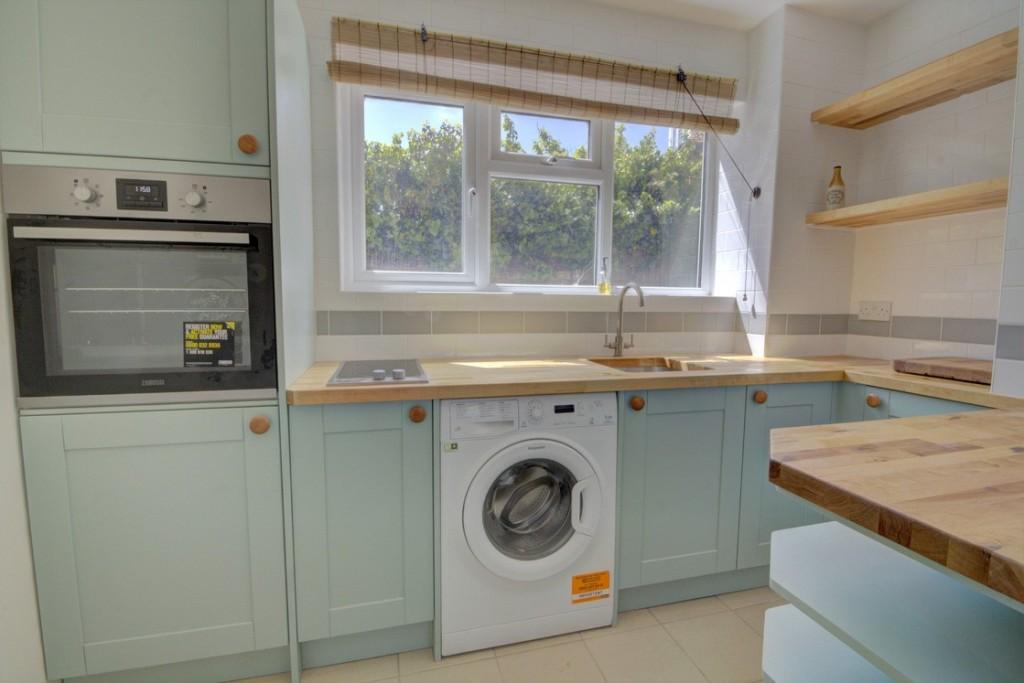 Flat 1 - kitchen before the tenant moved in provid