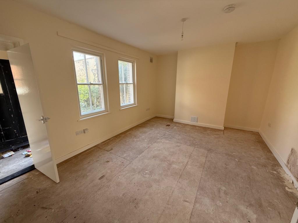 Living room with two windows to the front