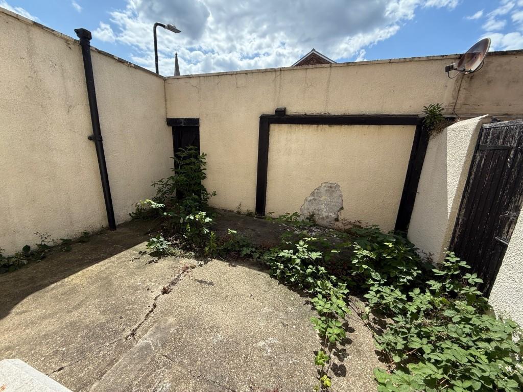 Yard to the rear of the property