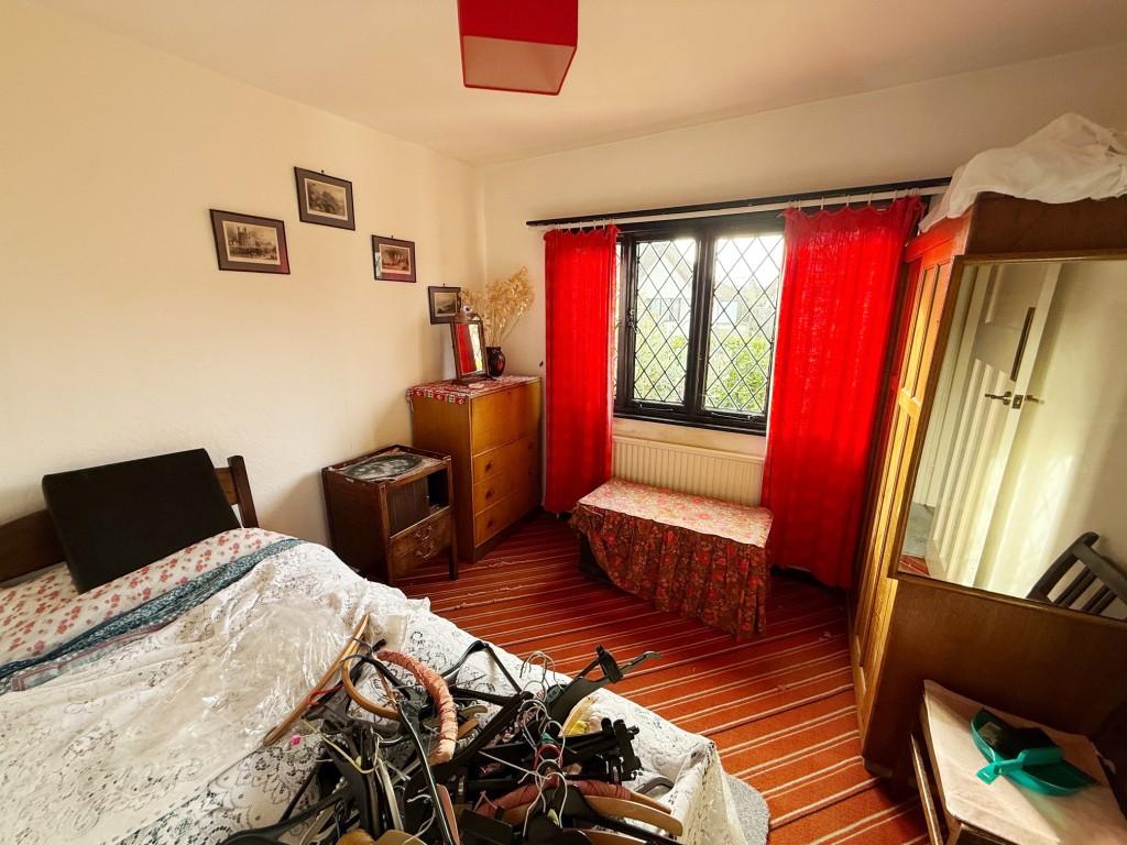 Bedroom three with window to the front