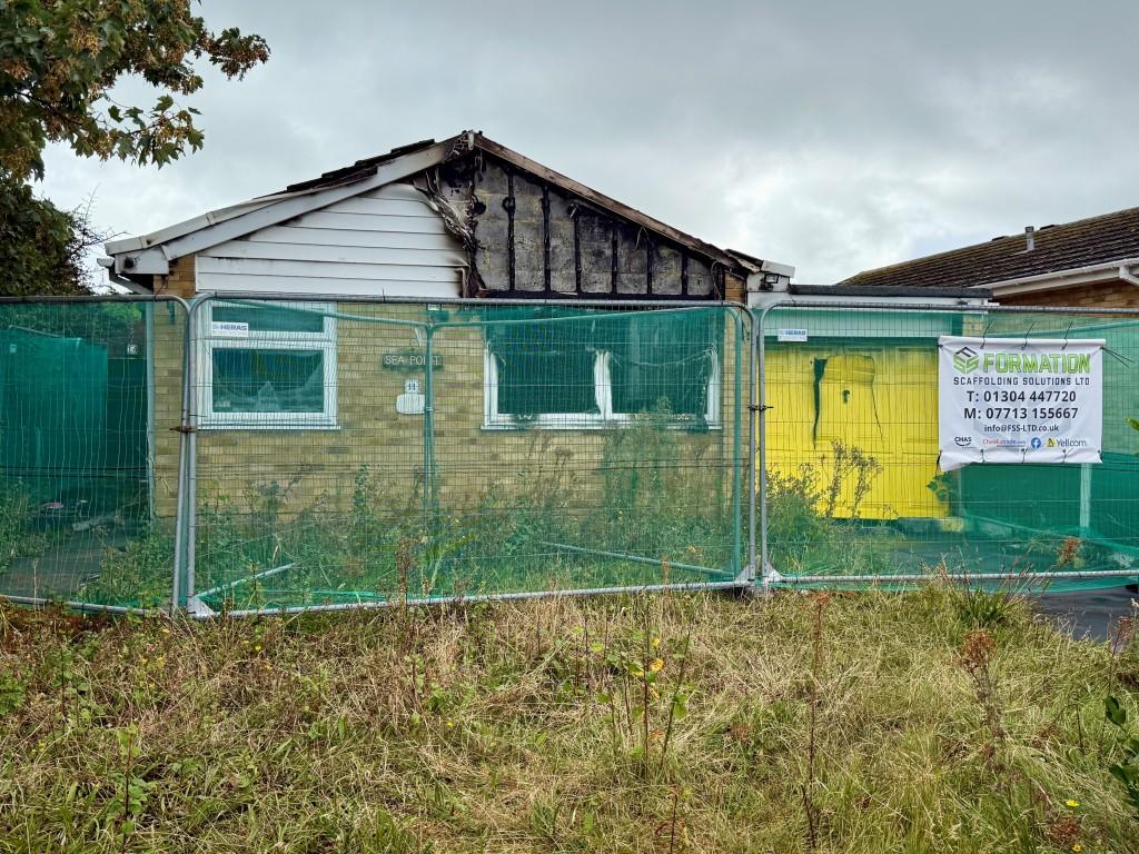 Detached fire damaged bungalow