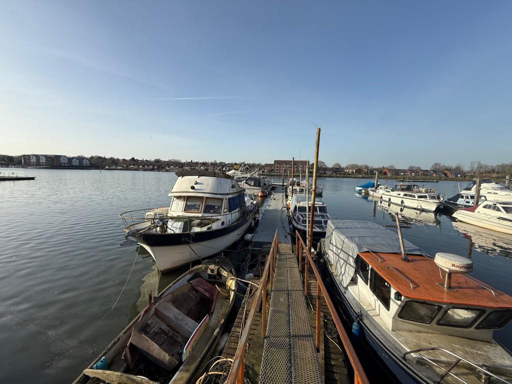 View of pontoon across river Itchen